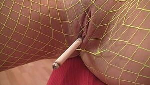 Fetish teenager smoking in spectacular fishnet tights