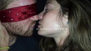 Sizzling Woman Smooching Dude Eyes covered